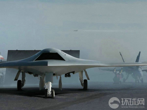 資料圖：X-47B無(wú)人機(jī)在航母上起降想象圖。